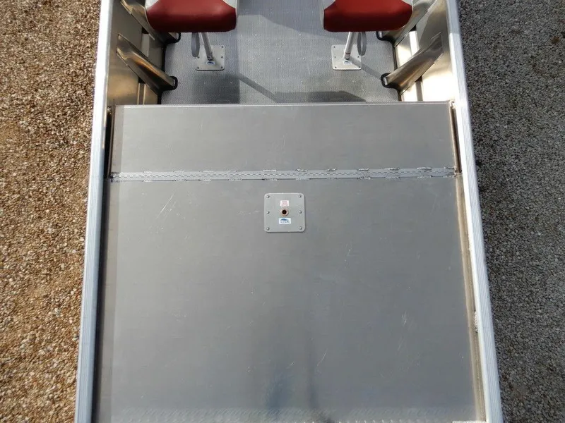 Slide: The Image of 2025 Blazer 1752 SC boat interior with red seats and metal flooring. - 25