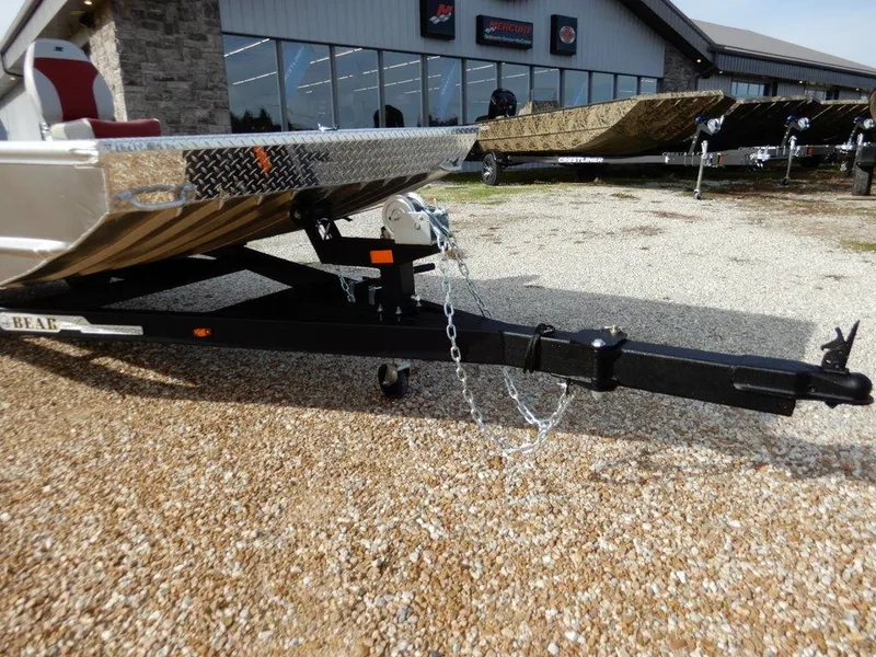 Slide: The Image of 2025 Blazer 1752 SC boat trailer parked on gravel near dealership. - 27