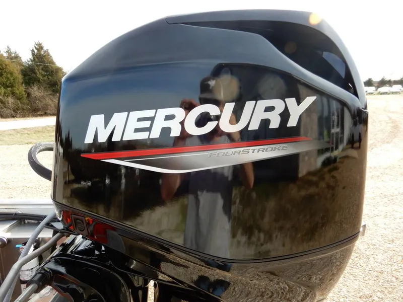 Slide: The Image of Mercury FourStroke engine on 2025 Blazer 1752 SC boat, outdoor setting. - 33