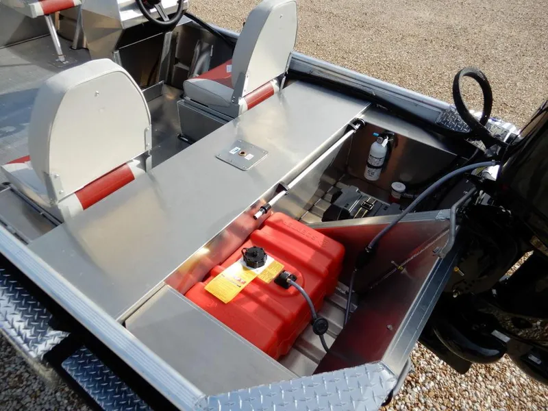 Slide: The Image of 2025 Blazer 1752 SC boat interior with seating, storage, and fuel tank. - 9