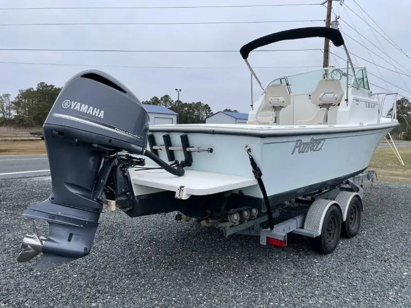 Slide: The Image of 2014 Parker 2310 Walkaround boat on trailer with Yamaha outboard motor. - 2