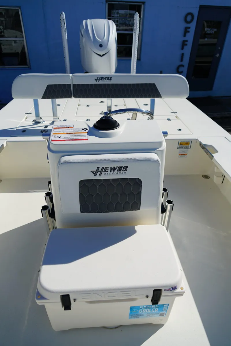 Slide: The Image of 2025 Hewes Redfisher 21 boat interior with seating and storage compartments. - 10