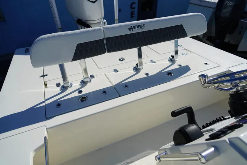 Slide: The Image of 2025 Hewes Redfisher 21 boat interior with steering wheel and seating. - 11