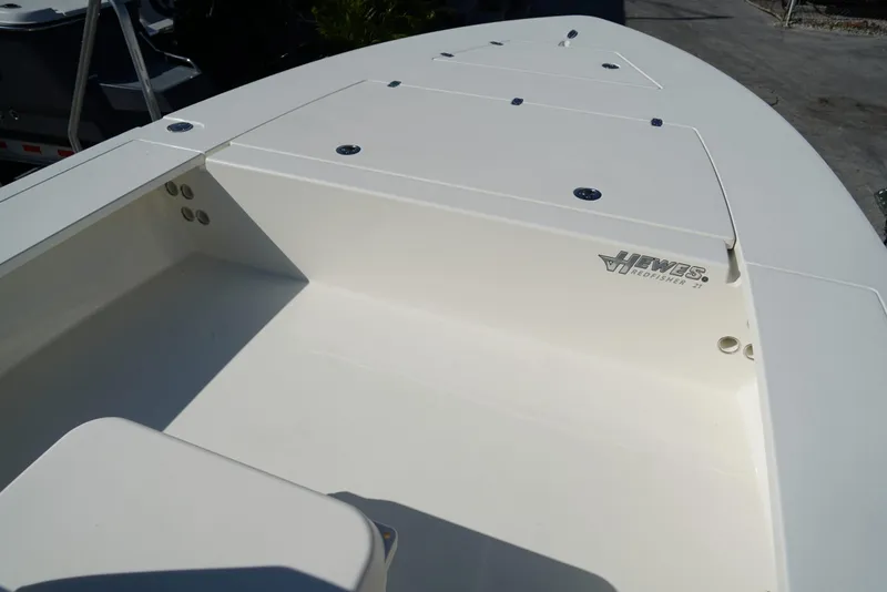 Slide: The Image of 2025 Hewes Redfisher 21 boat deck, showcasing sleek design and ample storage space. - 17