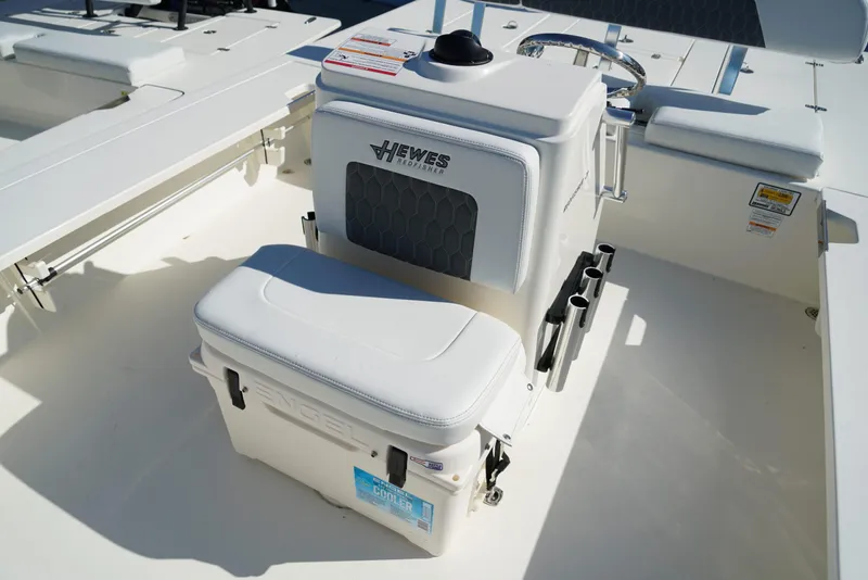 Slide: The Image of 2025 Hewes Redfisher 21 boat interior with seating and storage. - 19