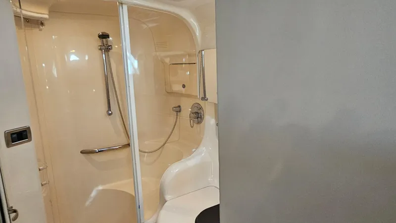Slide: The Image of Shower area in a 2003 Sea Ray 410 Express Cruiser yacht. - 46