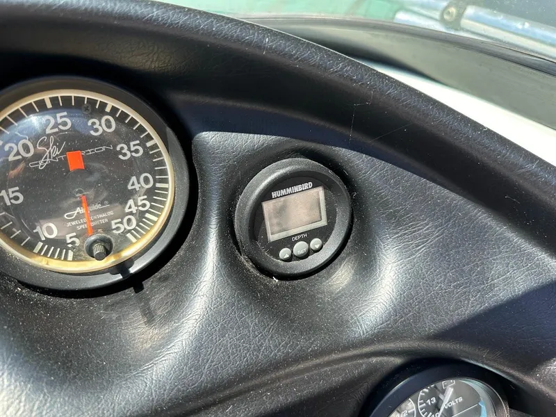 Slide: The Image of Dashboard of a 1998 Ski Centurion sport bowrider with speedometer and digital display. - 16