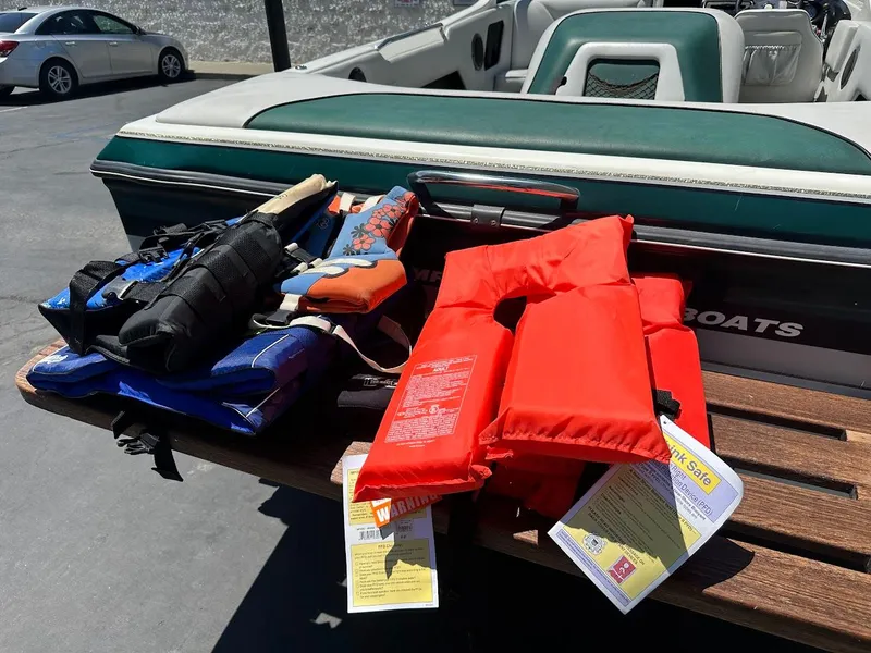 Slide: The Image of Life jackets and gear on a 1998 Ski Centurion sport bowrider boat. - 25