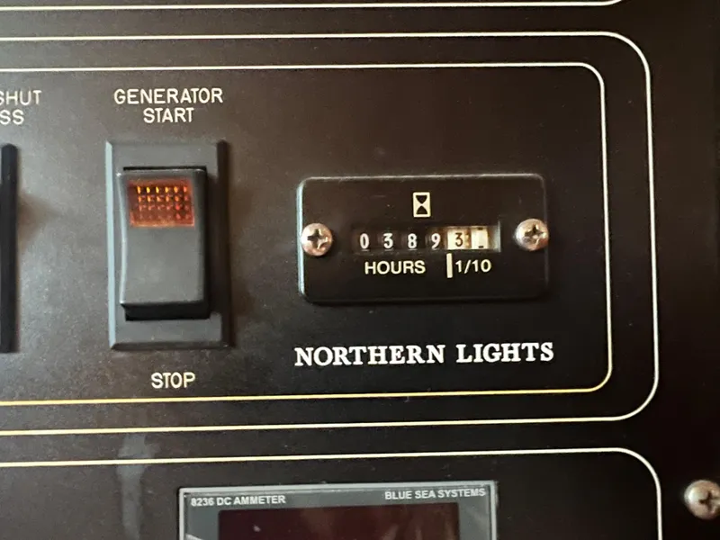 Slide: The Image of Control panel of a 1965 Romsdal Fjord with generator start and hour meter. - 22