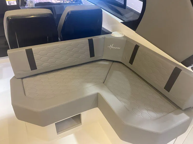 Slide: The Image of Luxurious seating in a 2025 Hanover 387 boat, featuring modern design and comfort. - 4