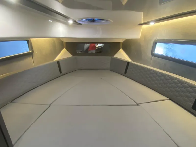 Slide: The Image of Luxurious interior of 2025 Hanover 387 boat with modern lighting and seating. - 8