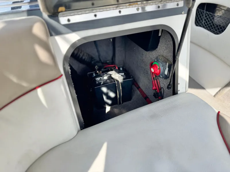 Slide: The Image of 2007 Malibu Wakesetter 247 LSV battery compartment with wiring and switch. - 25