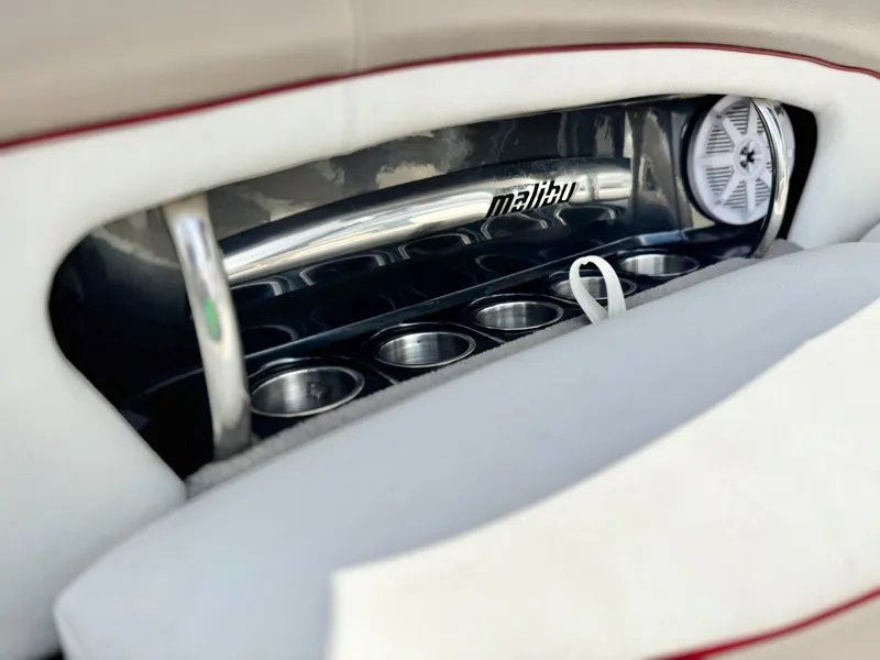 Slide: The Image of 2007 Malibu Wakesetter 247 LSV interior with cup holders and speaker detail. - 28