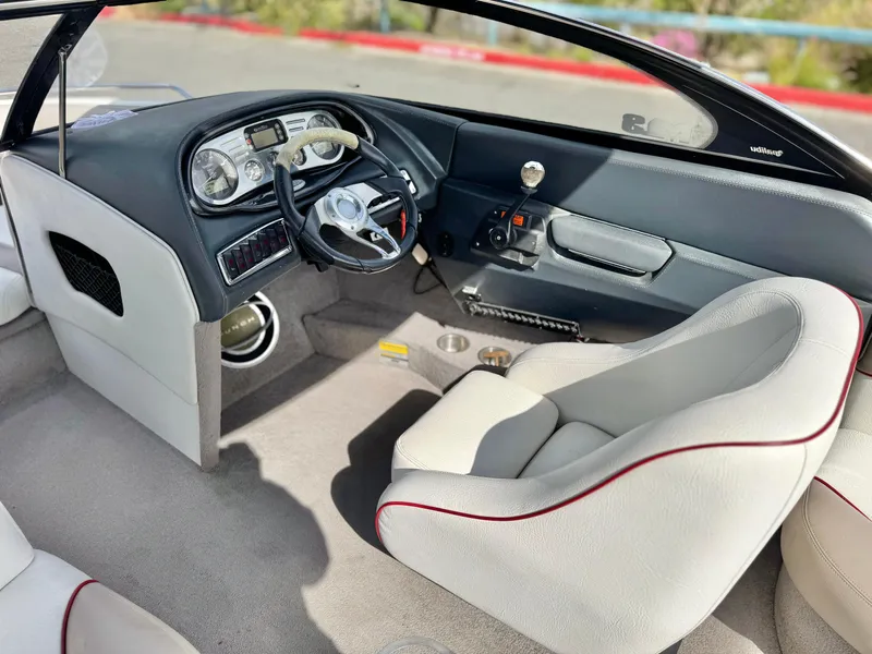 Slide: The Image of 2007 Malibu Wakesetter 247 LSV interior with steering wheel and dashboard. - 30