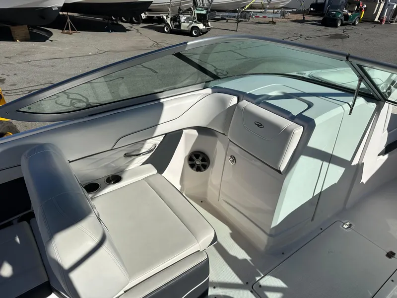 Slide: The Image of 2018 Regal 23 OBX boat interior with seating and dashboard. - 20