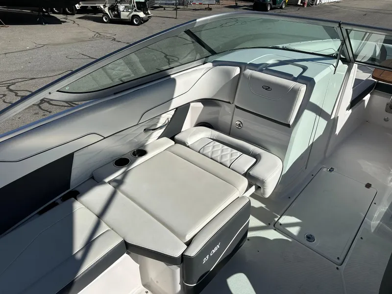 Slide: The Image of 2018 Regal 23 OBX boat interior with sleek seating and modern design. - 21