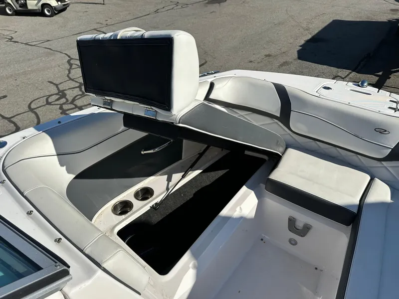 Slide: The Image of 2018 Regal 23 OBX boat interior with seating and storage compartments. - 30