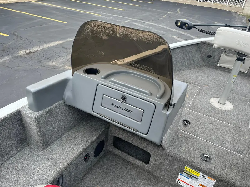 Slide: The Image of 2010 Alumacraft Navigator 175 CS boat interior with console and windshield. - 13