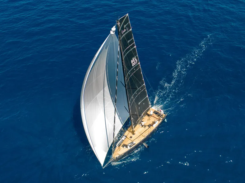 Slide: The Image of Aerial view of Black Pepper CODE 1 sailboat navigating blue ocean, 2025 model. - 4
