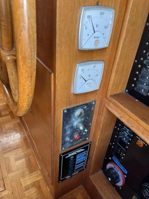 Slide: The Image of 1981 Grand Banks 36 Classic helm with gauges and control panel. - 12