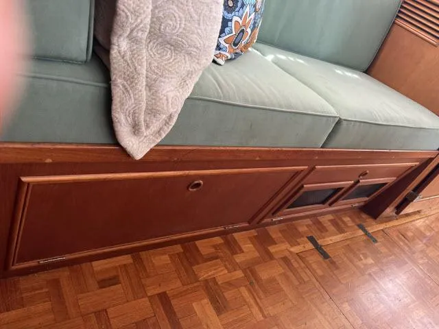 Slide: The Image of Interior of 1981 Grand Banks 36 Classic with wooden flooring and cushioned seating. - 9