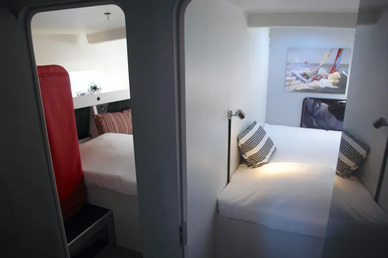 Slide: The Image of Two cozy bedrooms in a modern Black Pepper Code 2 yacht, 2025 model. - 17