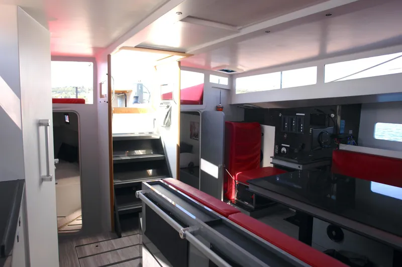Slide: The Image of Modern yacht interior with sleek design, featuring red and black accents, by Black Pepper Code 2, 2025. - 18