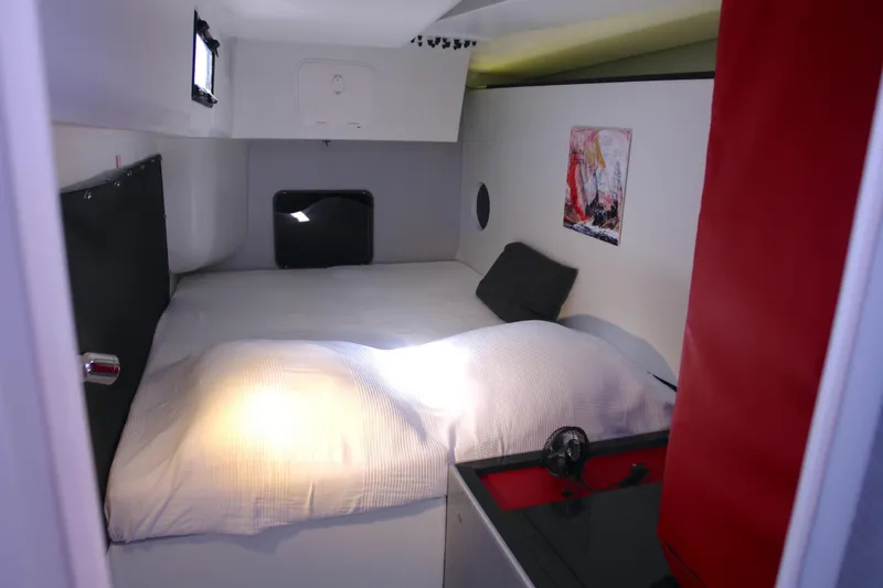 Slide: The Image of Cozy interior of Black Pepper Code 2 yacht, 2025 model, featuring a comfortable bed and modern design. - 19