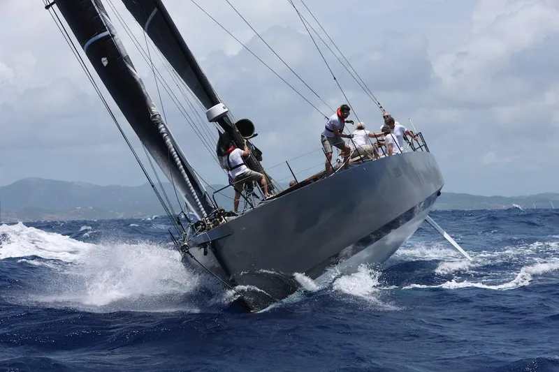 Slide: The Image of Sailing yacht Black Pepper Code 2, 2025 model, navigating through ocean waves. - 4