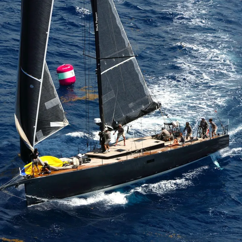 Slide: The Image of Sailing yacht "Black Pepper Code 2" navigating ocean waters, 2025 model. - 6
