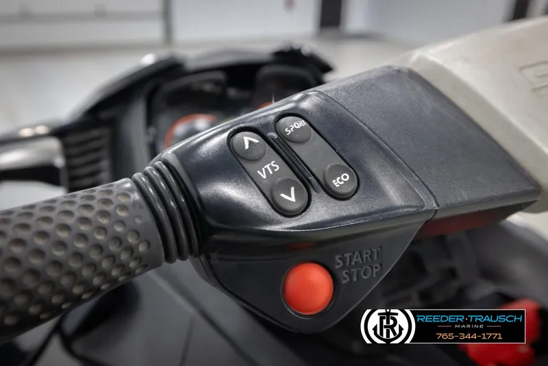 Slide: The Image of Close-up of 2015 Sea-Doo 215 WAKE PRO handlebar controls with start/stop button. - 14