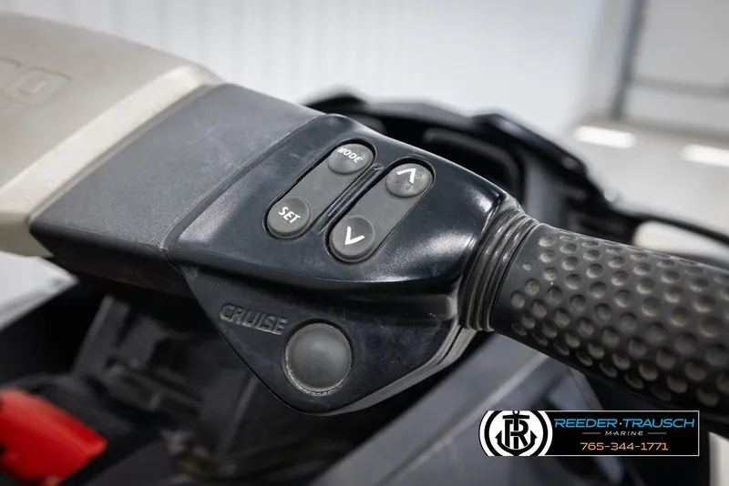 Slide: The Image of 2015 Sea-Doo 215 WAKE PRO handlebar controls with cruise and set buttons. - 16
