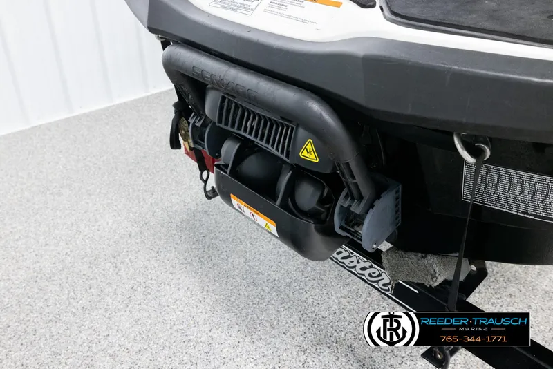 Slide: The Image of 2015 Sea-Doo 215 WAKE PRO rear view, showcasing engine and branding details. - 22