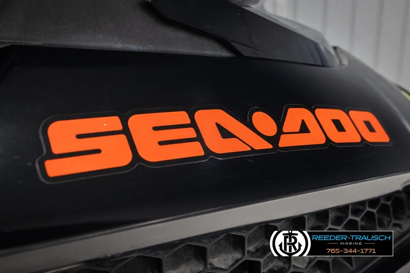 Slide: The Image of 2015 Sea-Doo 215 WAKE PRO logo on black surface, close-up view. - 27
