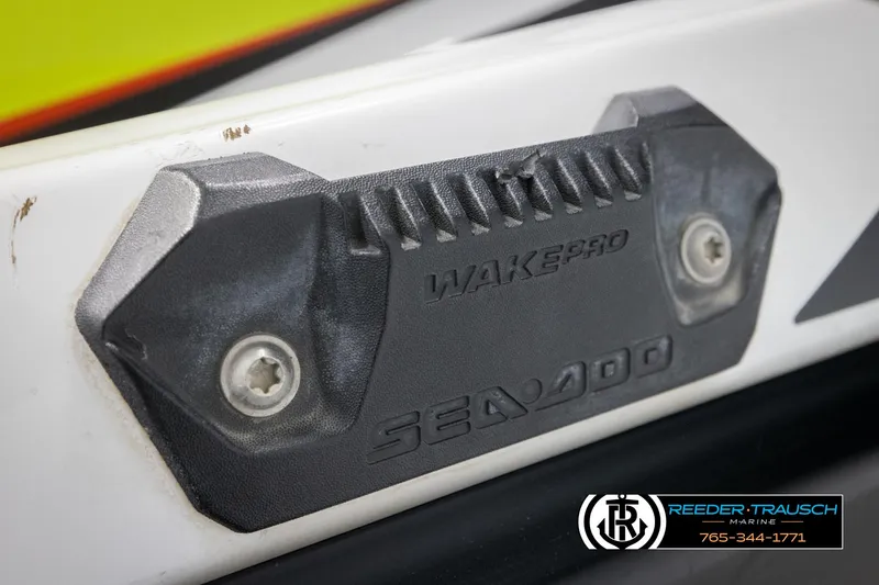 Slide: The Image of 2015 Sea-Doo 215 WAKE PRO detail with logo and mounting hardware. - 30