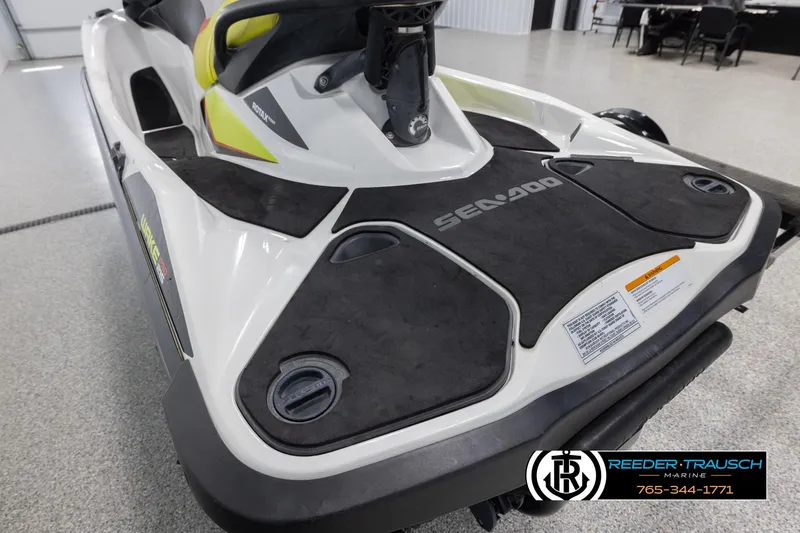Slide: The Image of 2015 Sea-Doo 215 WAKE PRO jet ski in showroom, rear view. - 9