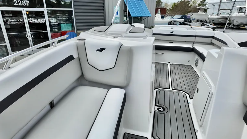 Slide: The Image of 2025 Starcraft SVX 211 IO boat interior with sleek seating and modern design. - 10