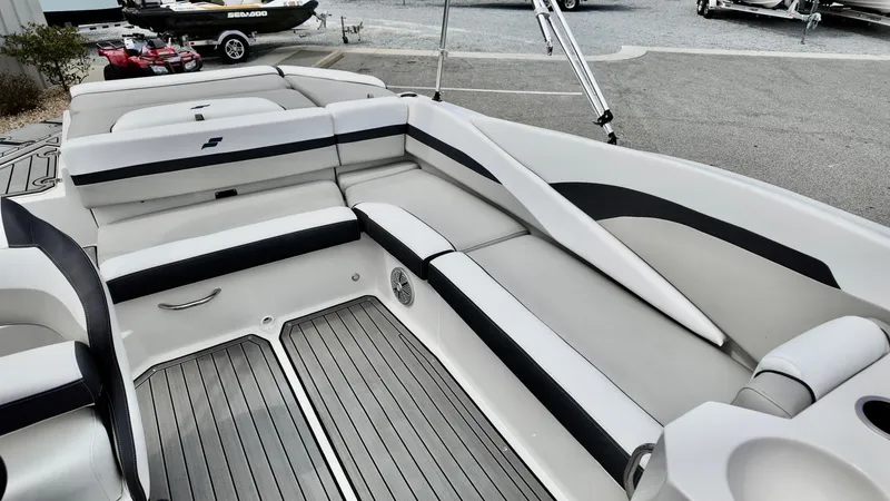 Slide: The Image of 2025 Starcraft SVX 211 IO boat interior with sleek seating and modern design. - 11