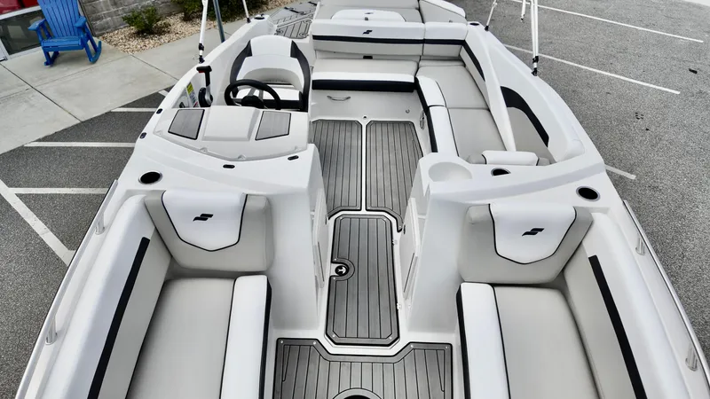 Slide: The Image of 2025 Starcraft SVX 211 IO boat interior with sleek seating and modern design. - 9