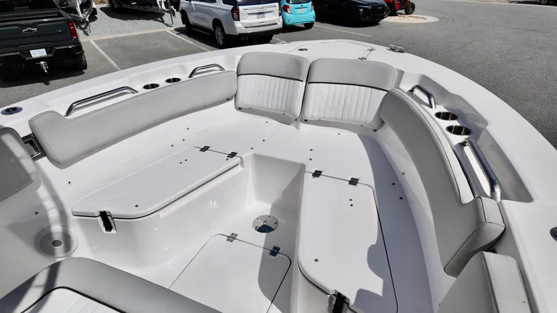 Slide: The Image of 2022 Sea Fox 228 Commander boat interior with spacious seating and storage compartments. - 5