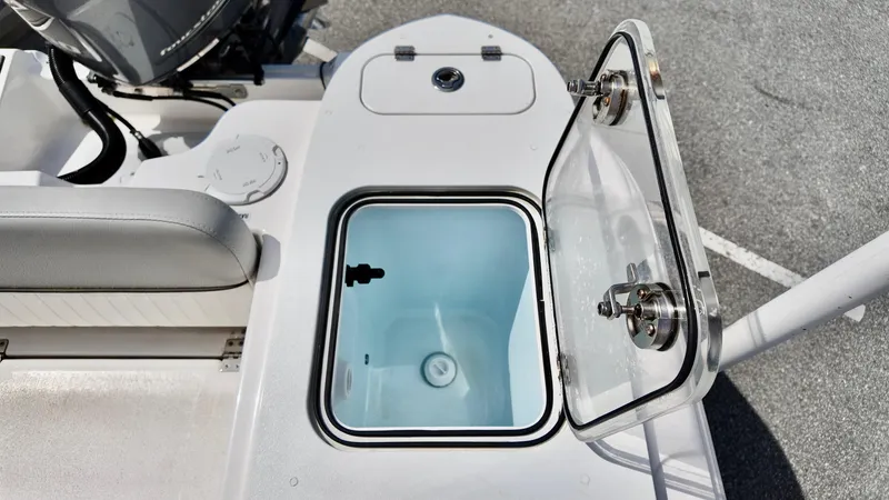 Slide: The Image of 2022 Sea Fox 228 Commander boat with open storage compartment. - 9
