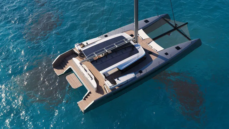 Slide: The Image of Luxurious Black Pepper Code C.69 catamaran sailing on clear blue ocean waters, 2025 model. - 4