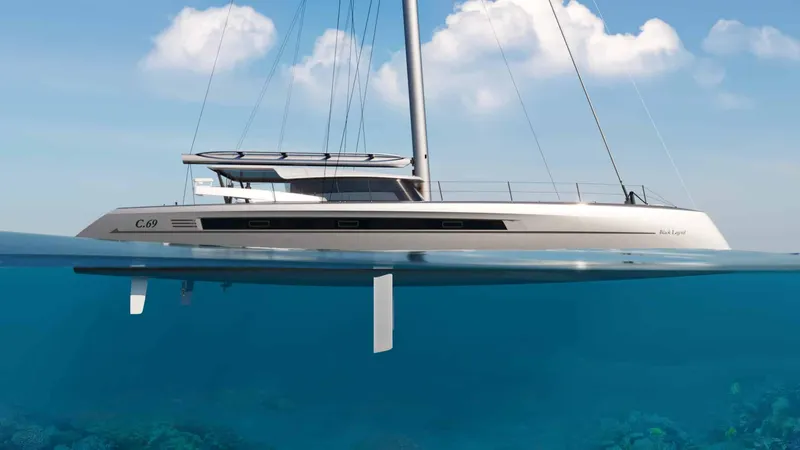 Slide: The Image of Sleek Black Pepper Code C.69 yacht sailing on clear blue water, 2025 model. - 6