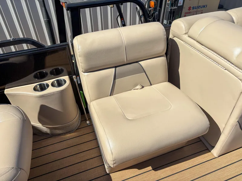 Slide: The Image of Beige seating on 2019 Trifecta 25 RF SS 3.0+ boat with cup holders. - 15
