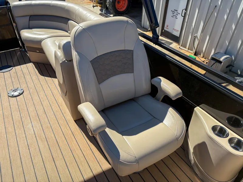 Slide: The Image of Luxurious seating on 2019 Trifecta 25 RF SS 3.0+ pontoon boat with cup holders. - 7