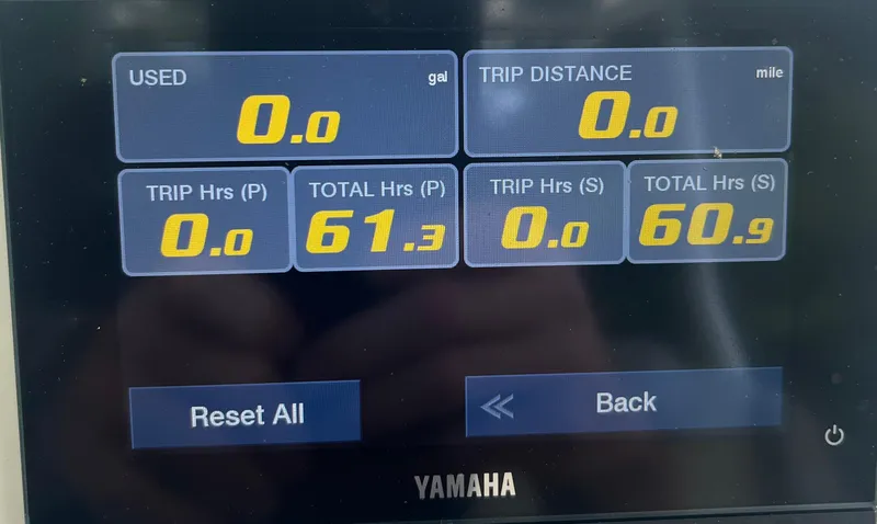 Slide: The Image of Display screen showing Key West 263 FS boat metrics, including fuel usage and trip hours. - 13