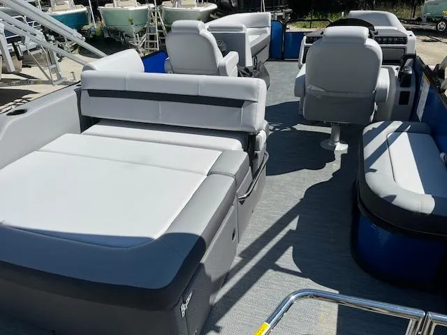 Slide: The Image of 2023 Godfrey SWEETWATER 2286 SFL pontoon boat interior with spacious seating and modern design. - 11