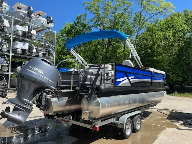Slide: The Image of 2023 Godfrey SWEETWATER 2286 SFL pontoon boat with Yamaha motor on trailer. - 4