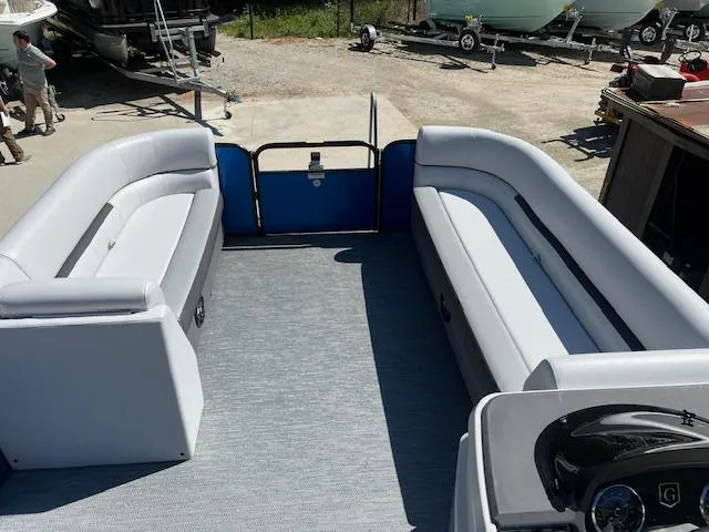 Slide: The Image of 2023 Godfrey SWEETWATER 2286 SFL pontoon boat interior with spacious seating. - 6