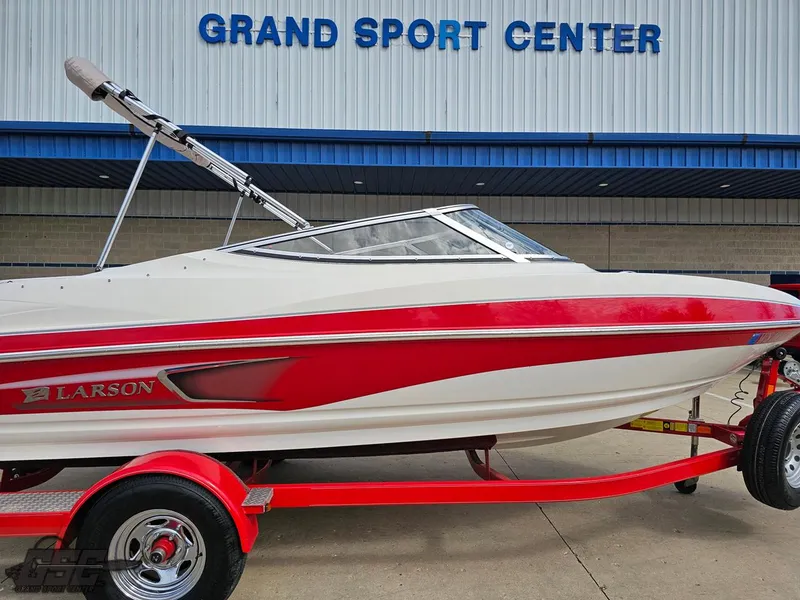 Slide: The Image of 2010 Larson Senza 186 boat in red and white at Grand Sport Center. - 4